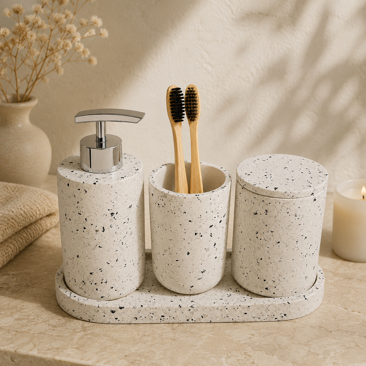 Kit minimalista em cimento com dispenser, porta-escovas e pote sobre base artesanal.